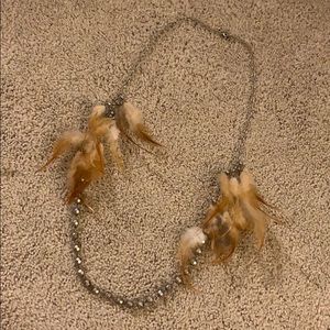 Silver necklace with feathers